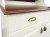 kredens drewniany KRM-1, wykończenie - kolor kryjący biały +wieniec górny, boazeria, blat w patynie brąz, fronty drzwi komody - proste,  nadstawki - łuk, wieniec górny - ozdobny, wieniec dolny - cokół prosty, uchwyty - muszelka stare złoto C192